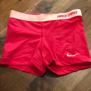 Pink and orange Nike pro spandex